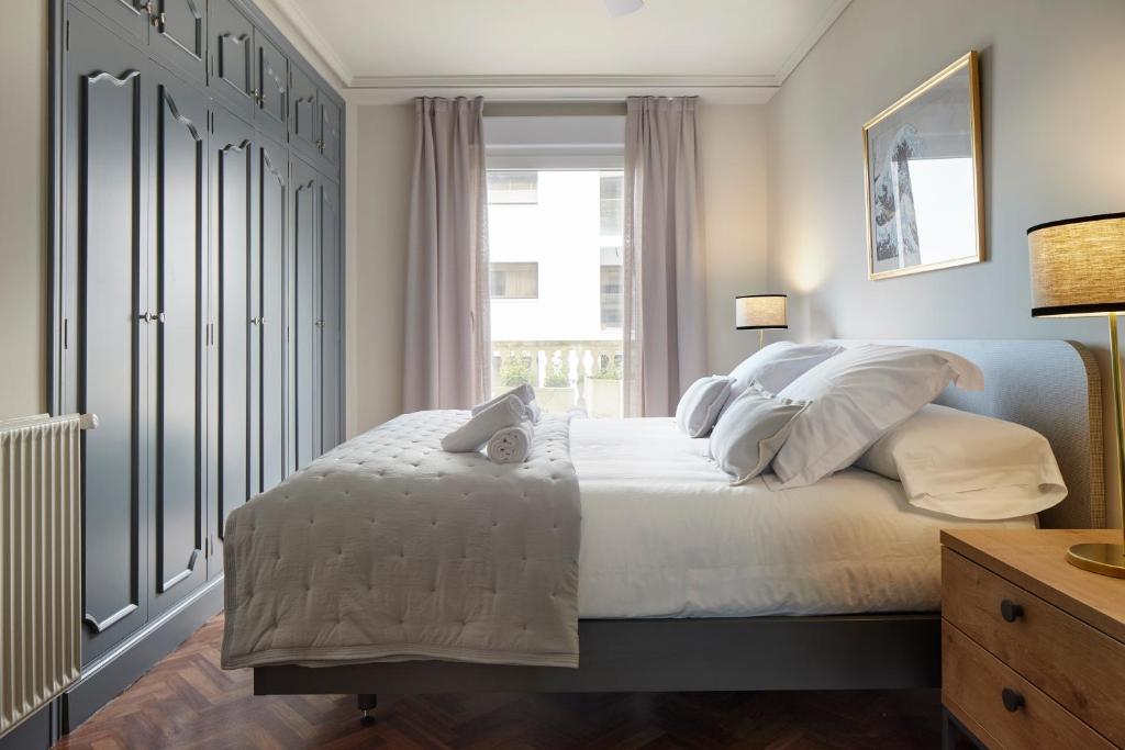 Posteľ alebo postele v izbe v ubytovaní MIRACONCHA TERRACE by SWEET HOME SAN SEBASTIAN
