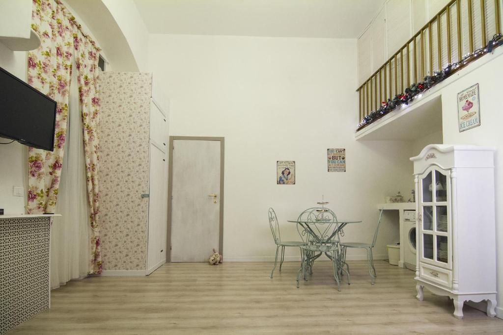 TV a/nebo společenská místnost v ubytování Residenza Fiori di Grano