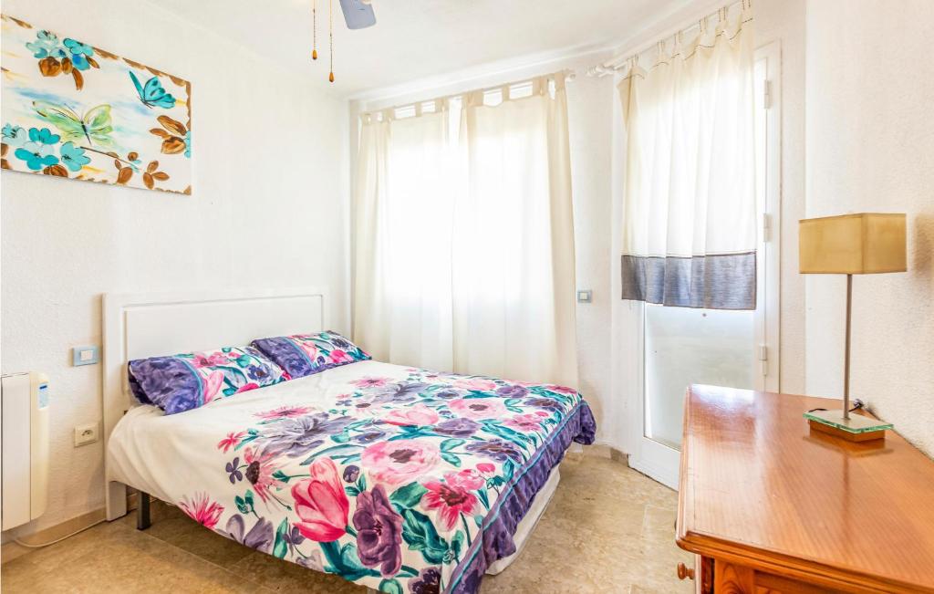A bed or beds in a room at Gorgeous Apartment In Calahonda