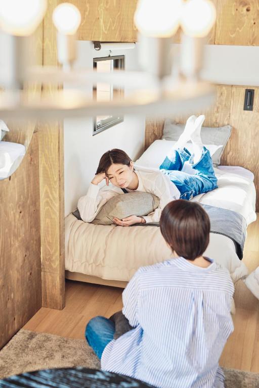 Postel nebo postele na pokoji v ubytování GLANSTELLA CABIN Fujiyamanakako