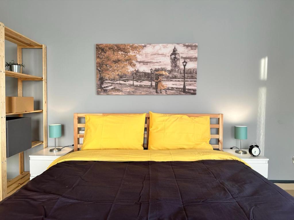 Cama o camas de una habitación en Modern Designed and Cozy Apartment