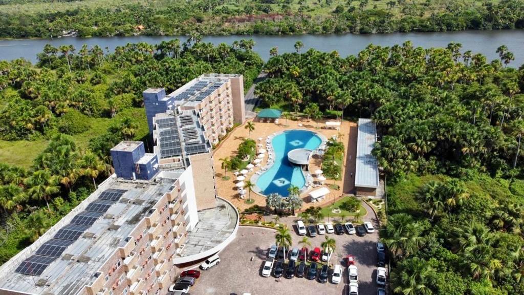 an aerial view of a resort with a pool at Gran Lençóis Flat Barreirinhas Apt 509 in Barreirinhas