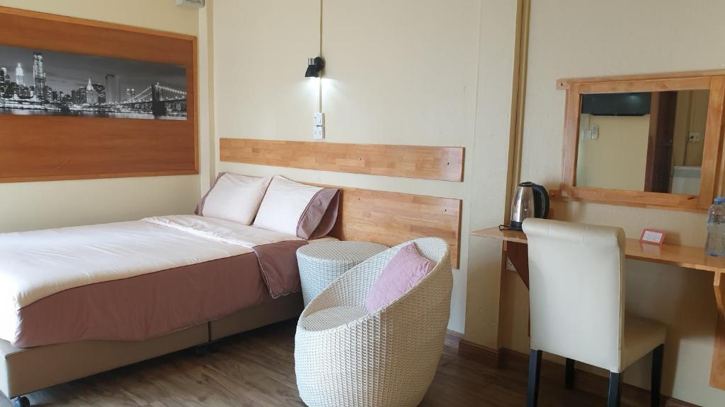 Postel nebo postele na pokoji v ubytování Little Guest House Hotel