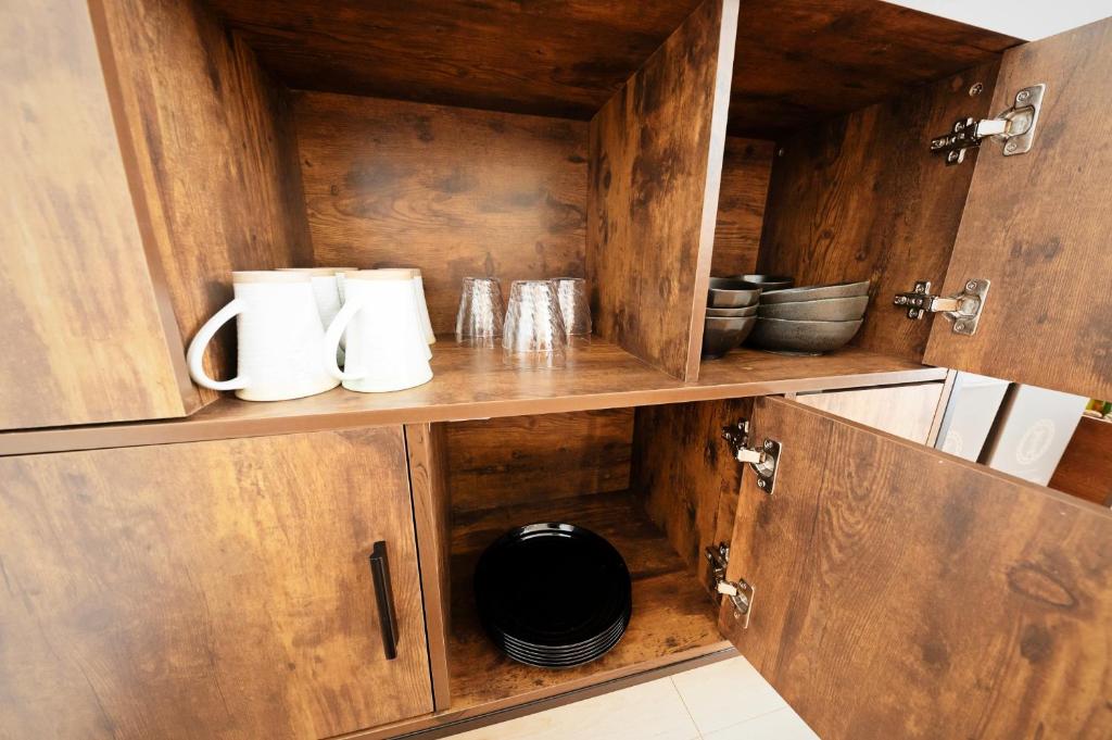 Kuchyň nebo kuchyňský kout v ubytování APHONGO HOTEL