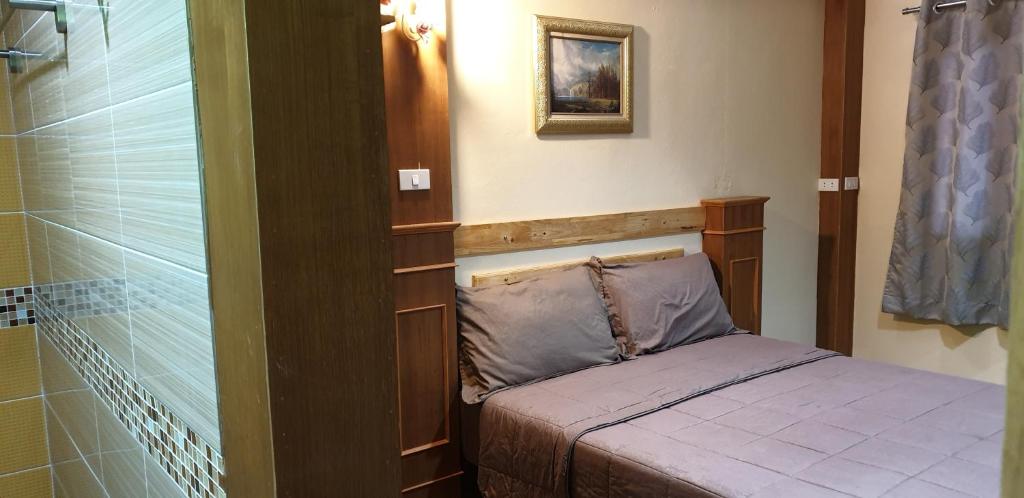 Postel nebo postele na pokoji v ubytování Little Guest House Hotel