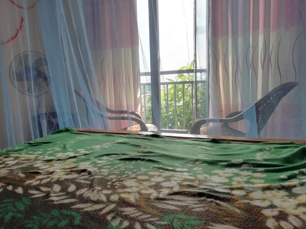 Postel nebo postele na pokoji v ubytování Dreamscape home stay