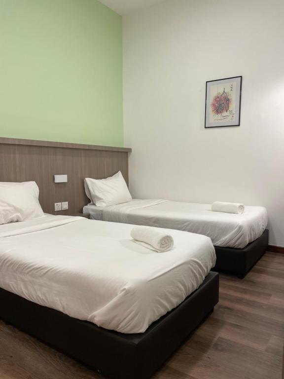 Postel nebo postele na pokoji v ubytování BENUTTEN 99 HOTEL