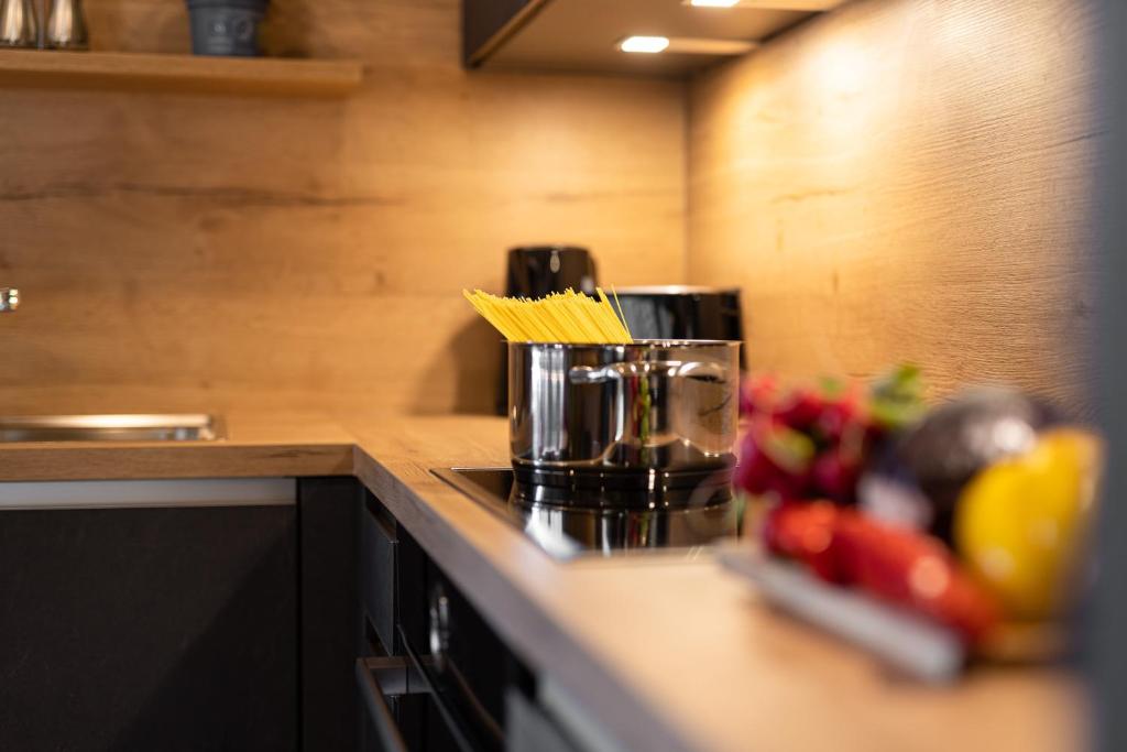 Kuchyň nebo kuchyňský kout v ubytování Apartments am Bichl