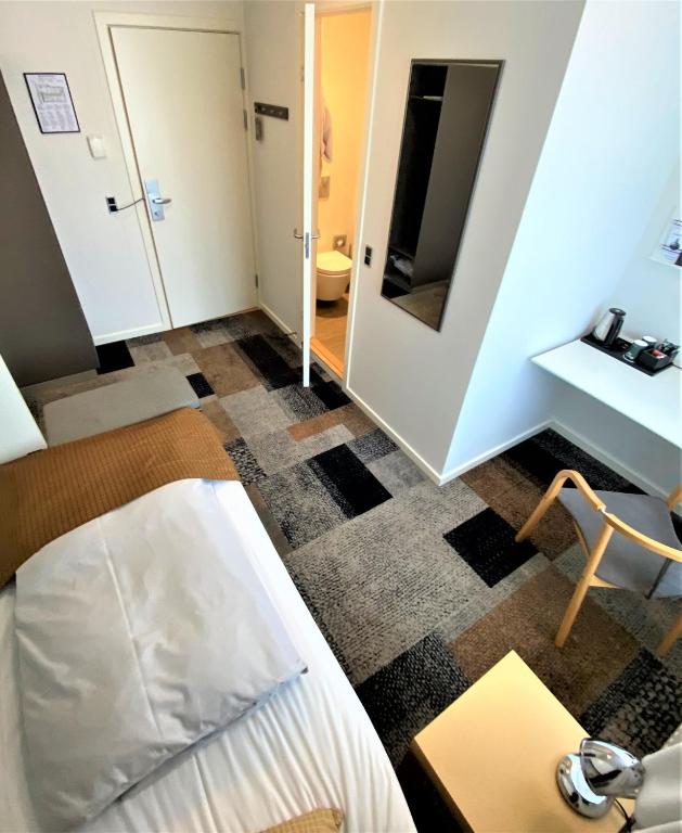 Voodi või voodid majutusasutuse Hotel Skivehus toas