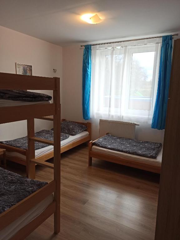 Postel nebo postele na pokoji v ubytování Holiday House Adrelot
