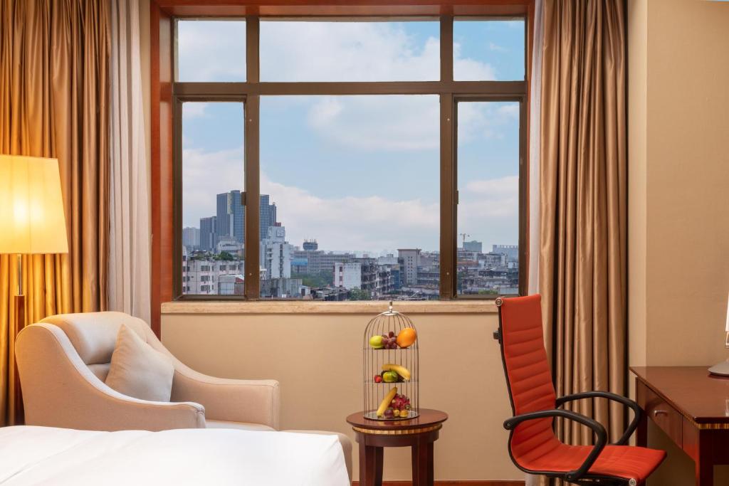 Postel nebo postele na pokoji v ubytování Crowne Plaza Foshan by IHG - Canton Fair free shuttle bus