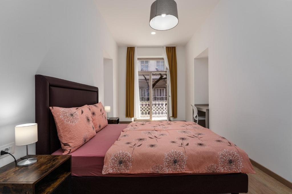 Postel nebo postele na pokoji v ubytování Hostel Antique