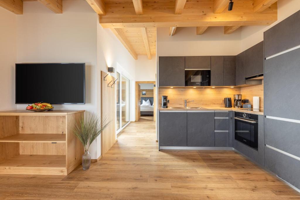 Kuchyň nebo kuchyňský kout v ubytování Apartments am Bichl