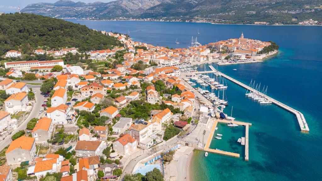 an aerial view of a town with a harbor at Siriščević Apartment in Korčula