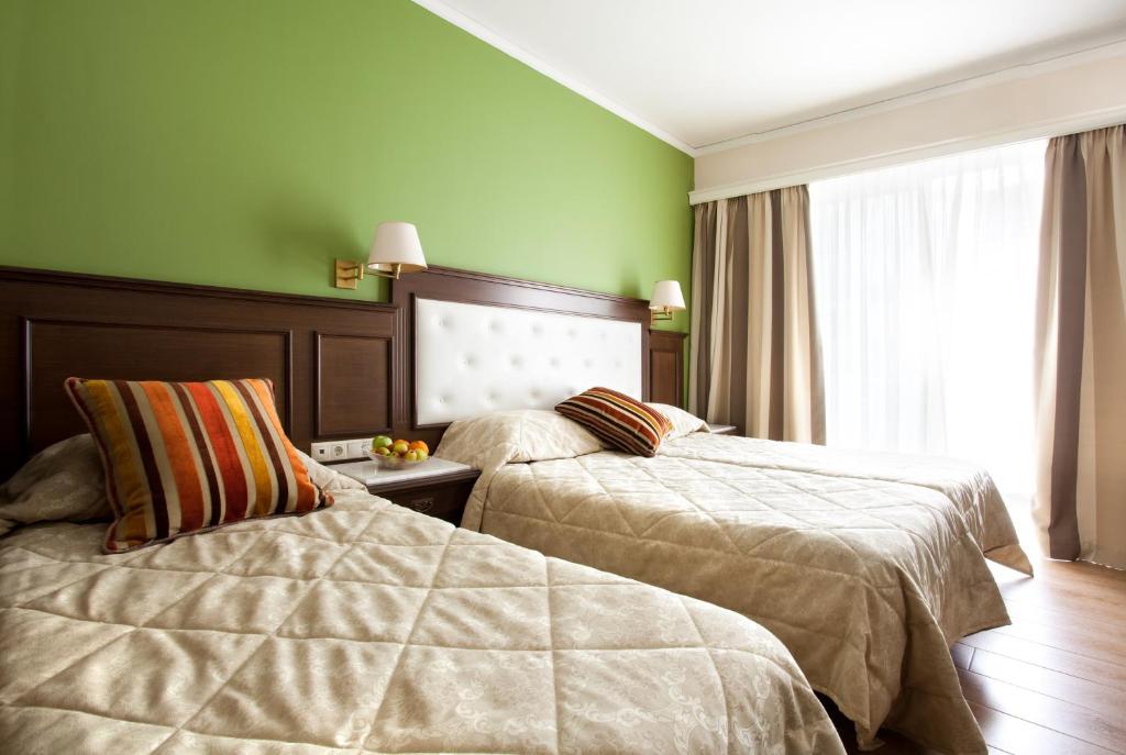 
Triple Room (2 Adults + 1 Child)
