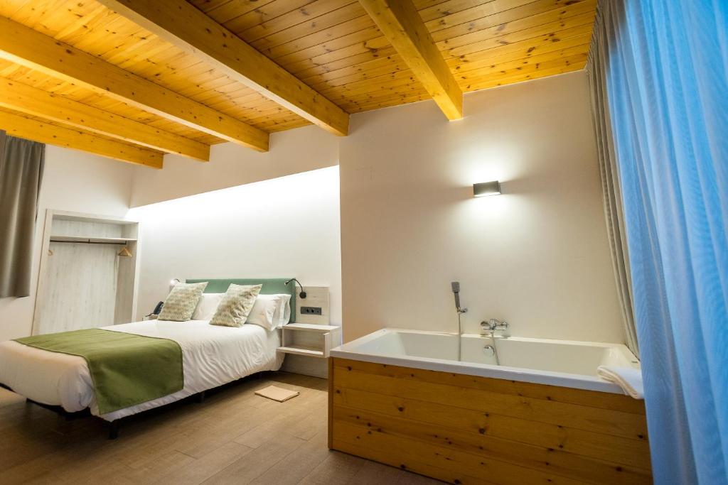 Posteľ alebo postele v izbe v ubytovaní Hotel Villa Retiro