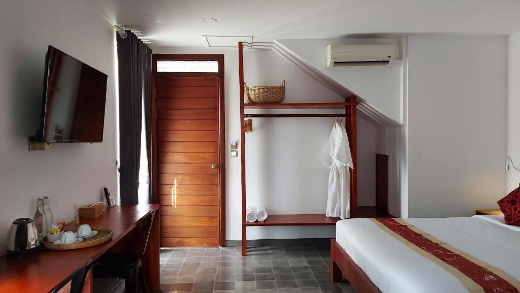 Postel nebo postele na pokoji v ubytování Sok Hotel And Coffee Siem Reap
