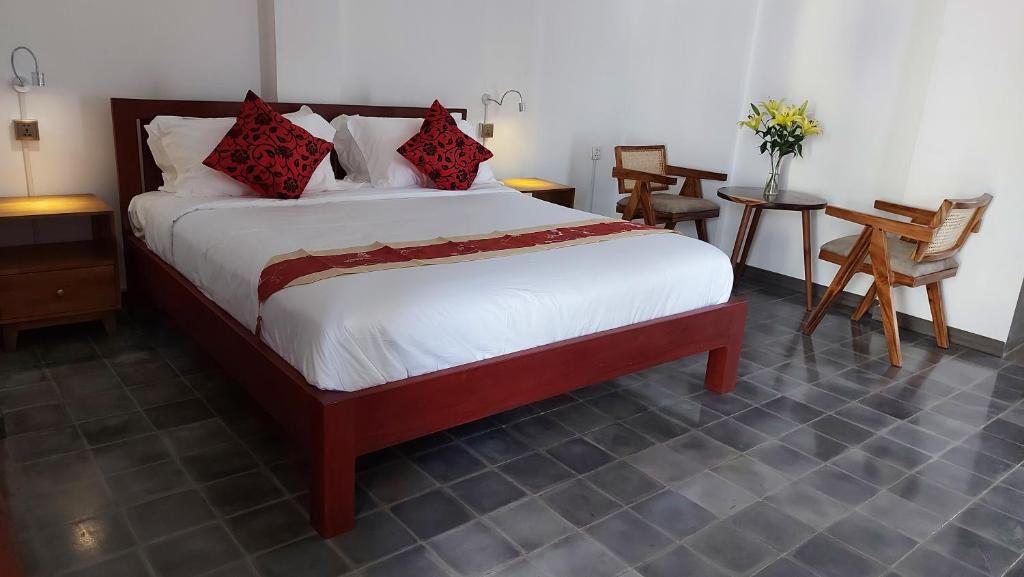 Postel nebo postele na pokoji v ubytování Sok Hotel And Coffee Siem Reap