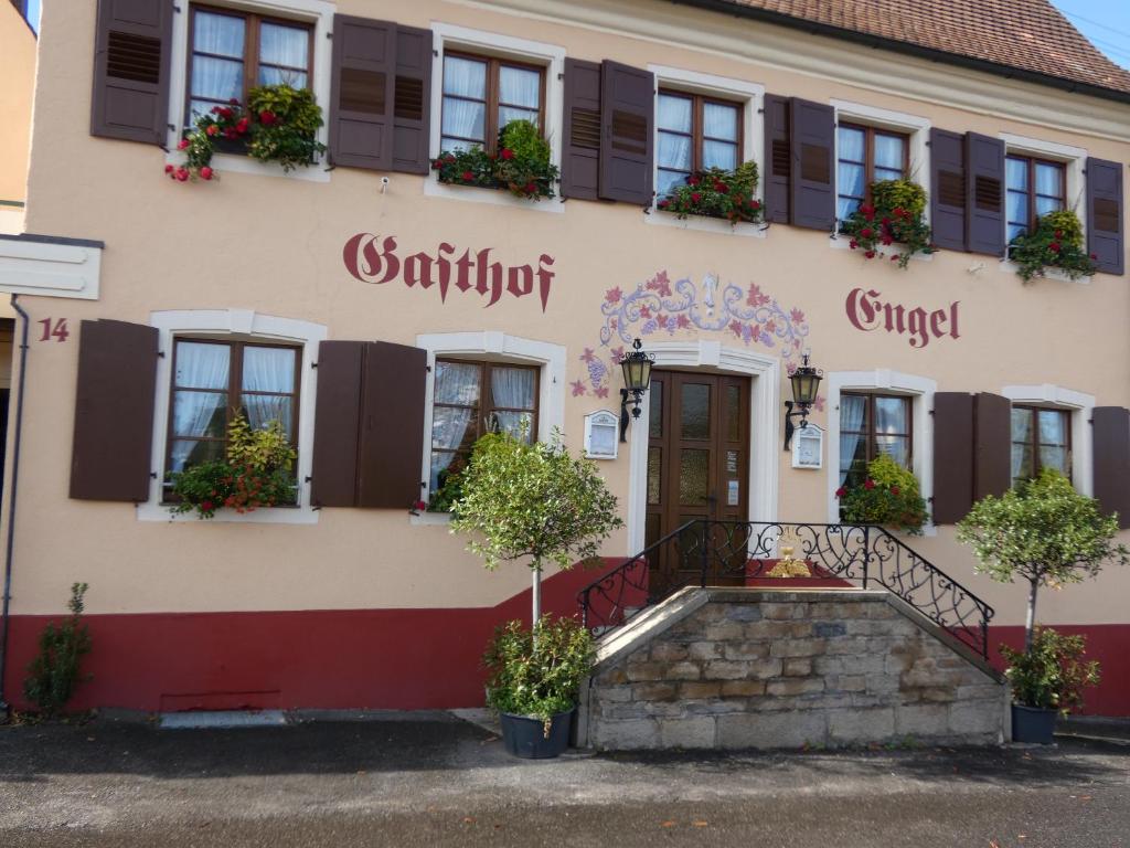 a building in the town of sintra with plants at Gasthof Engel in Dottingen