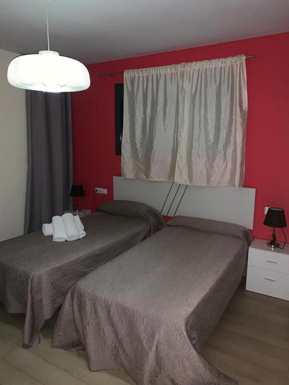 Posteľ alebo postele v izbe v ubytovaní Apartamentos 16:9 Playa Suites