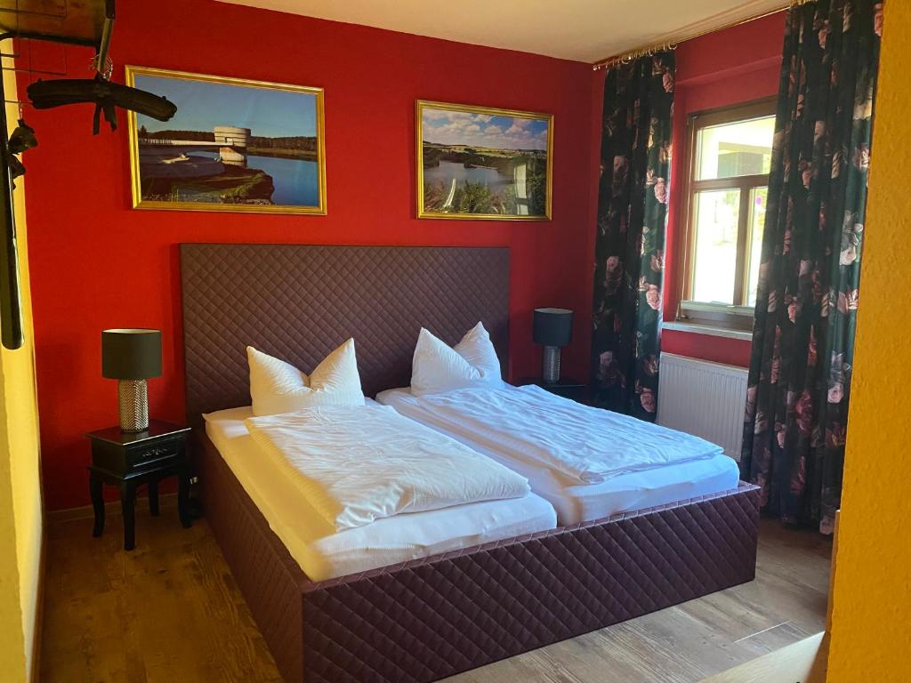 Voodi või voodid majutusasutuse Riverdam Boutique Hotel toas
