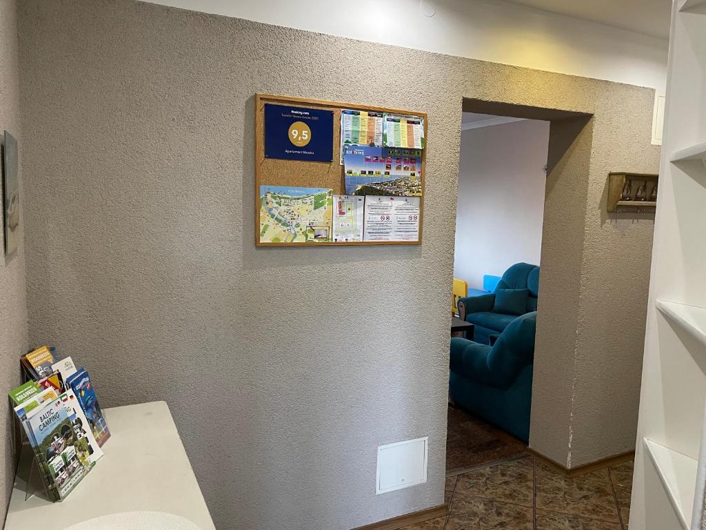 Televízia a/alebo spoločenská miestnosť v ubytovaní Apartament Mieszka