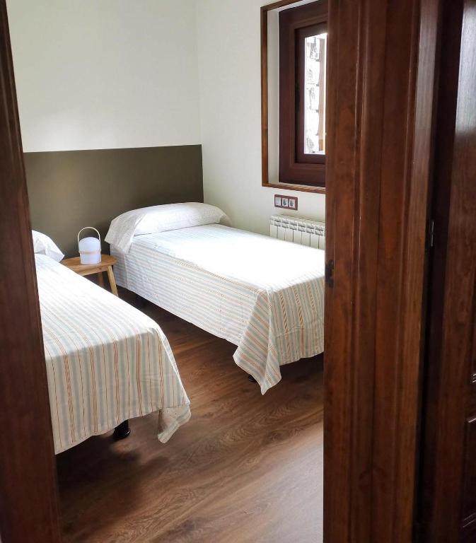 Posteľ alebo postele v izbe v ubytovaní Casa adosada en Guils