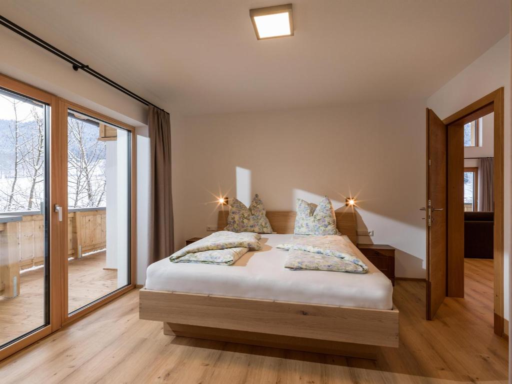 Postel nebo postele na pokoji v ubytování Haus Seisl