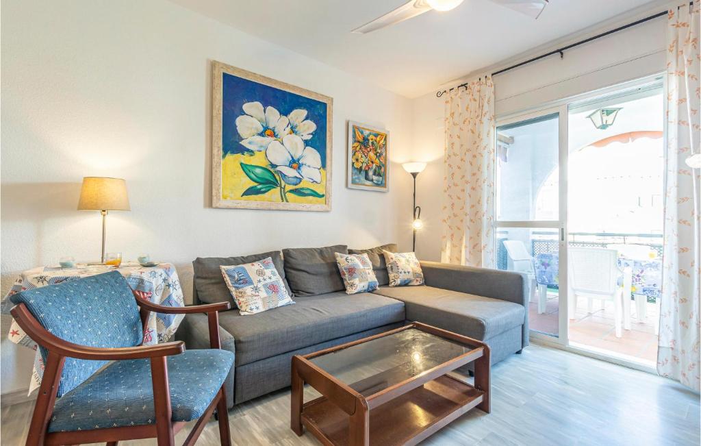 A seating area at 2 Bedroom Nice Apartment In Torrox