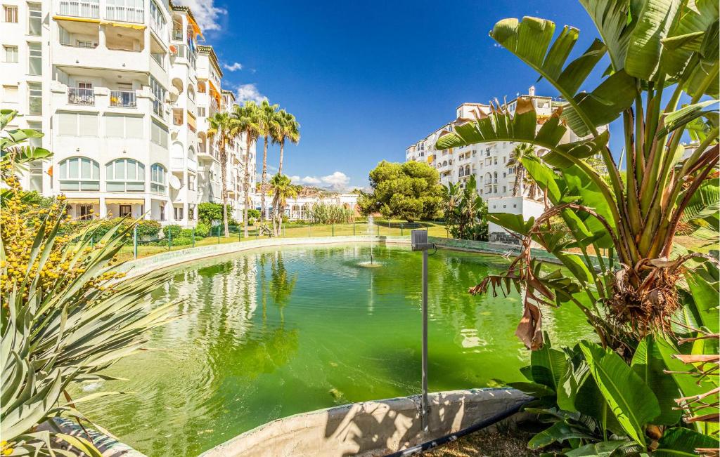 A garden outside 2 Bedroom Nice Apartment In Torrox
