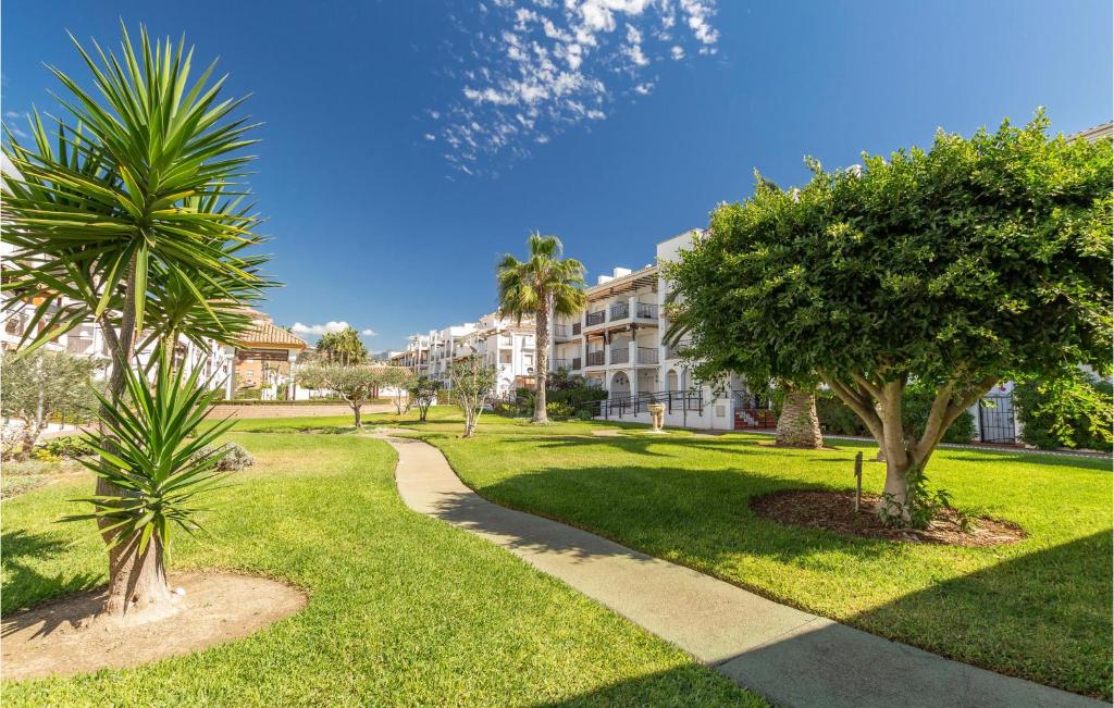A garden outside 2 Bedroom Nice Apartment In Torrox