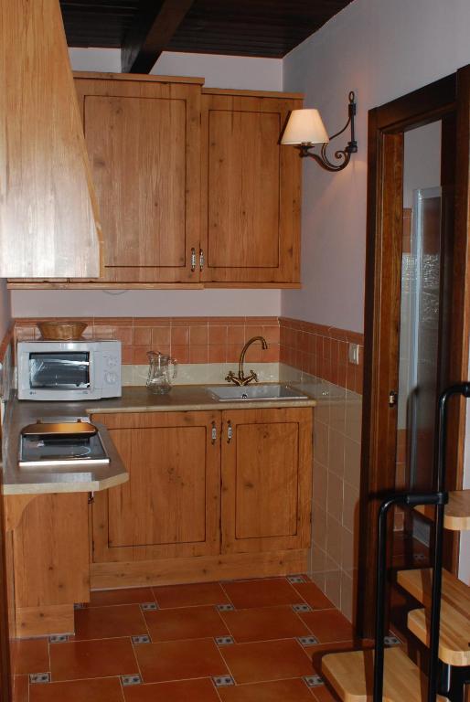 Kuchyň nebo kuchyňský kout v ubytování Finca El Encinar
