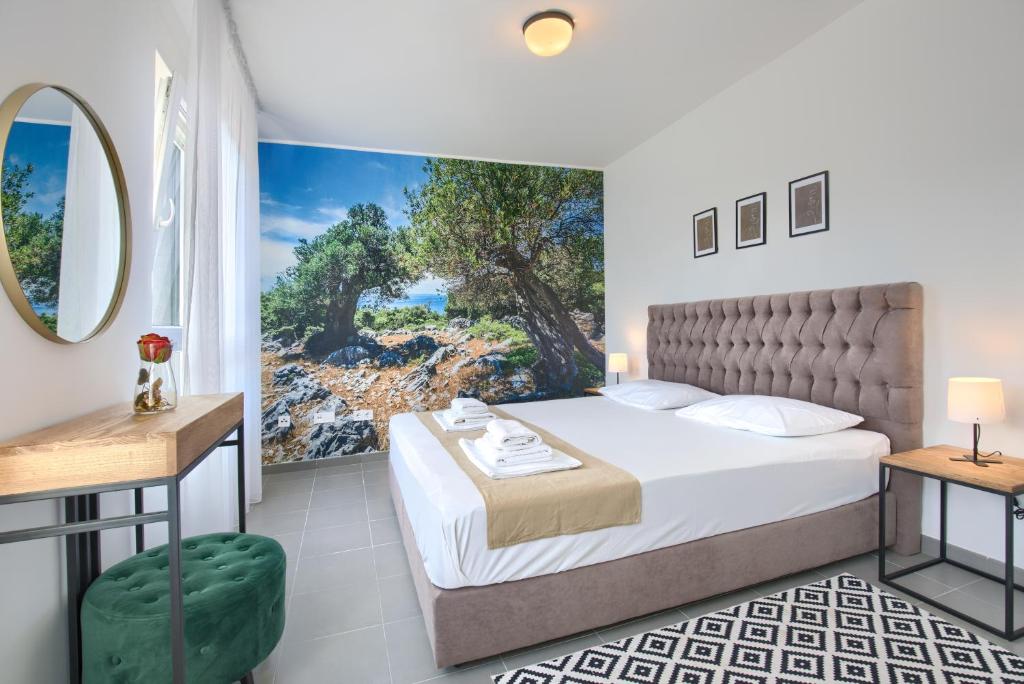 Posteľ alebo postele v izbe v ubytovaní Beautiful Two-Bedroom Seaside Apartment in Premantura
