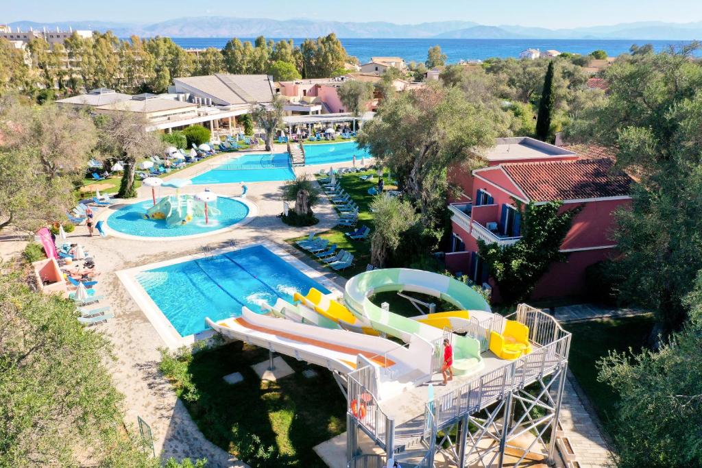 an aerial view of a resort with a swimming pool at SENTIDO Apollo Palace in Mesongi