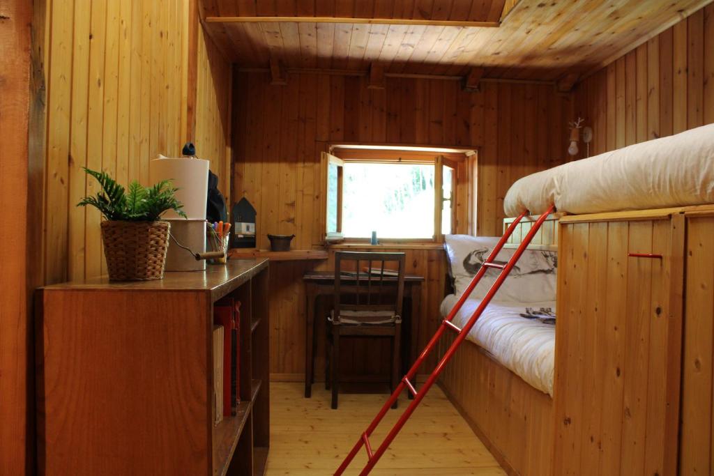 Łóżko lub łóżka w pokoju w obiekcie Sweet Somma Mountain Lodge 2