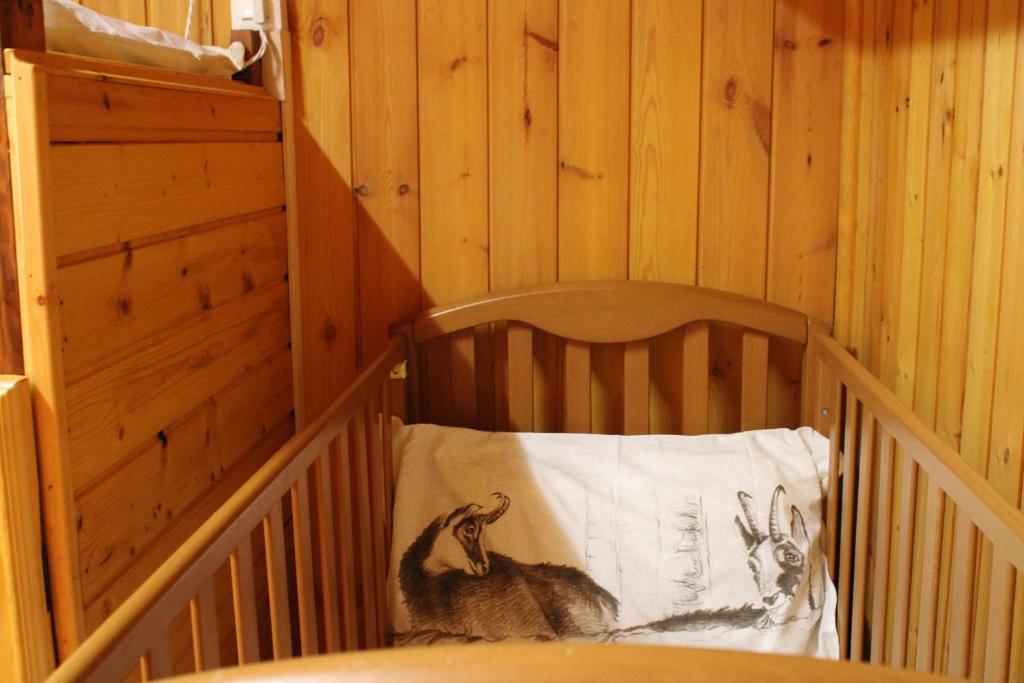 Łóżko lub łóżka w pokoju w obiekcie Sweet Somma Mountain Lodge 2