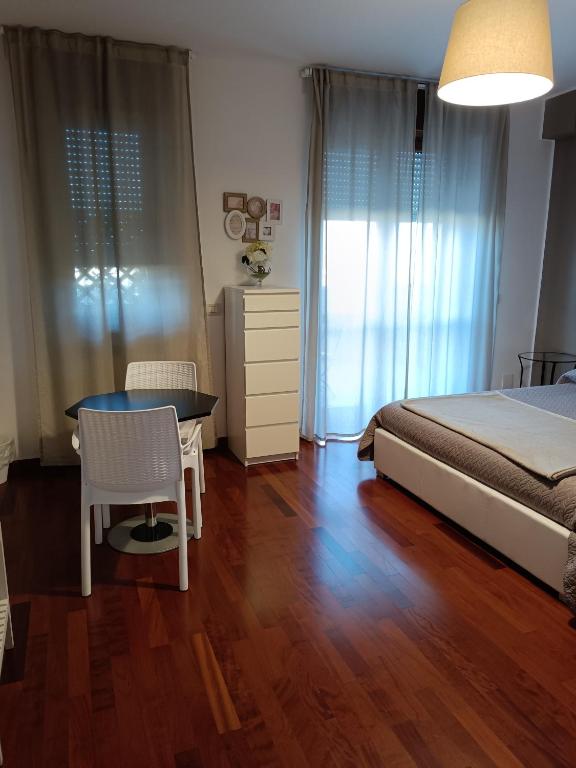 Postel nebo postele na pokoji v ubytování B&B Giulio Cesare