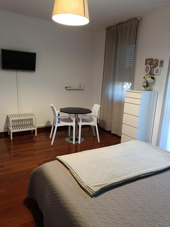Postel nebo postele na pokoji v ubytování B&B Giulio Cesare