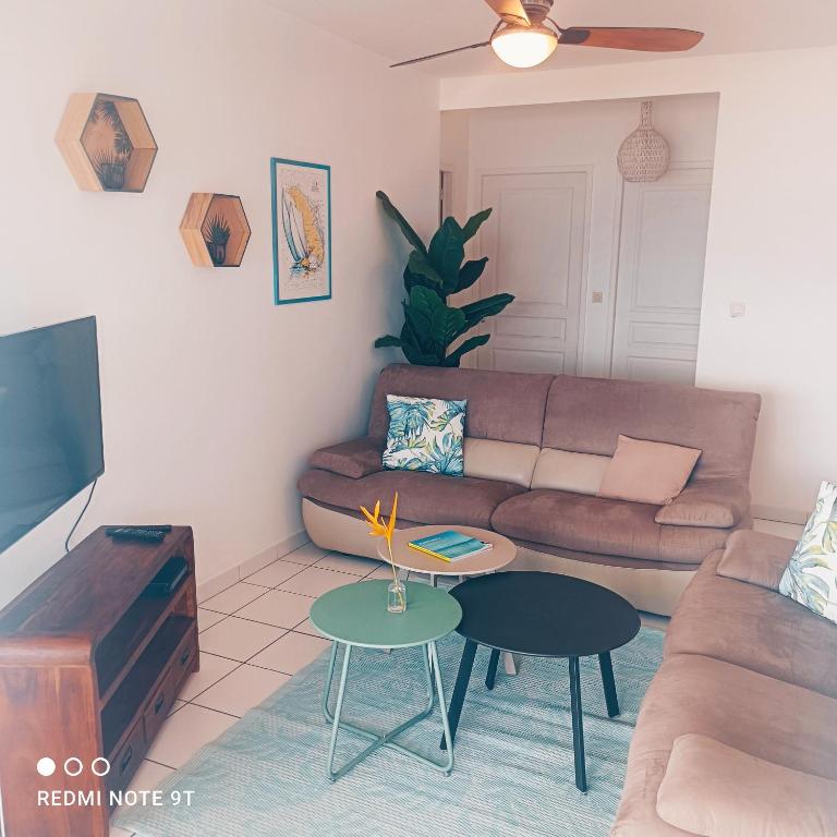 Posezení v ubytování Appartement Ti Bato