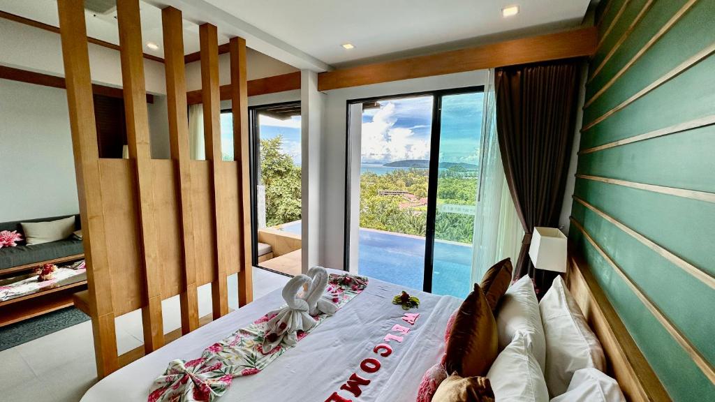 Postel nebo postele na pokoji v ubytování Aonang Phu Dahla Private Pool & Sea View - SHA Plus