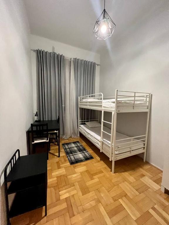 Posteľ alebo postele v izbe v ubytovaní Cent Hostel