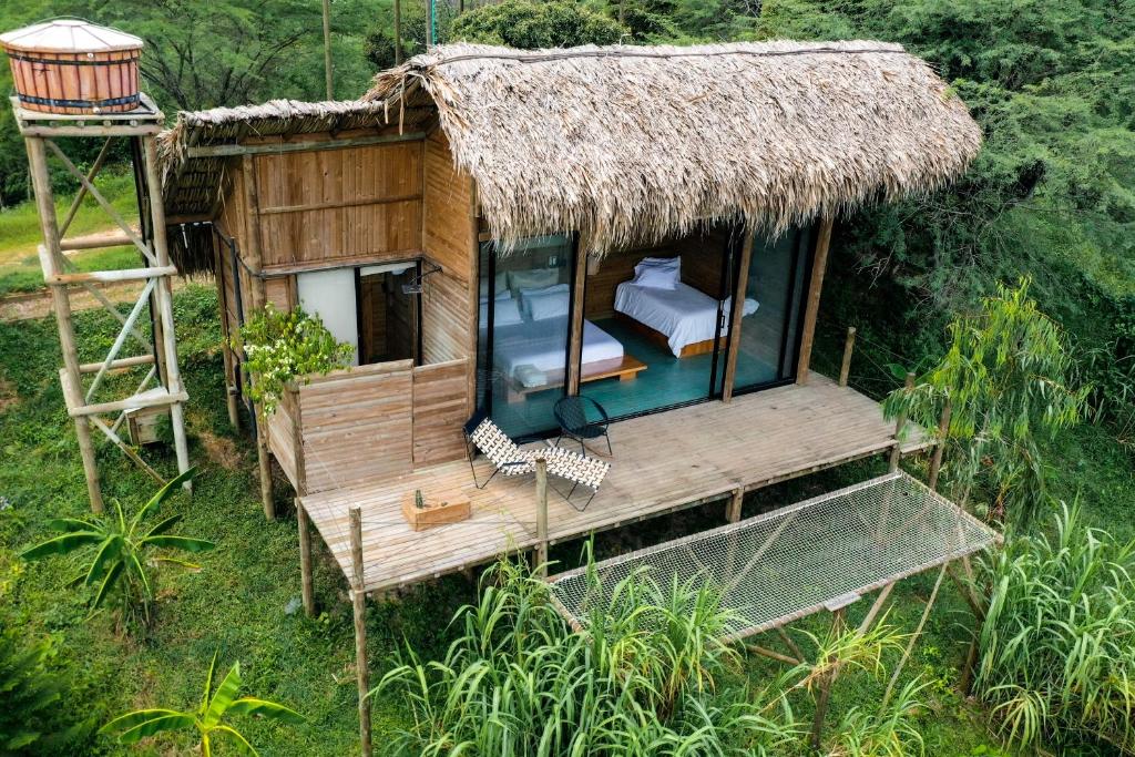 an overhead view of a small hut with a deck at Ankua Eco Hotel in Usiacurí