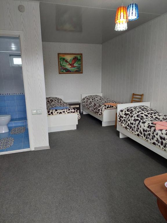 Postel nebo postele na pokoji v ubytování Best