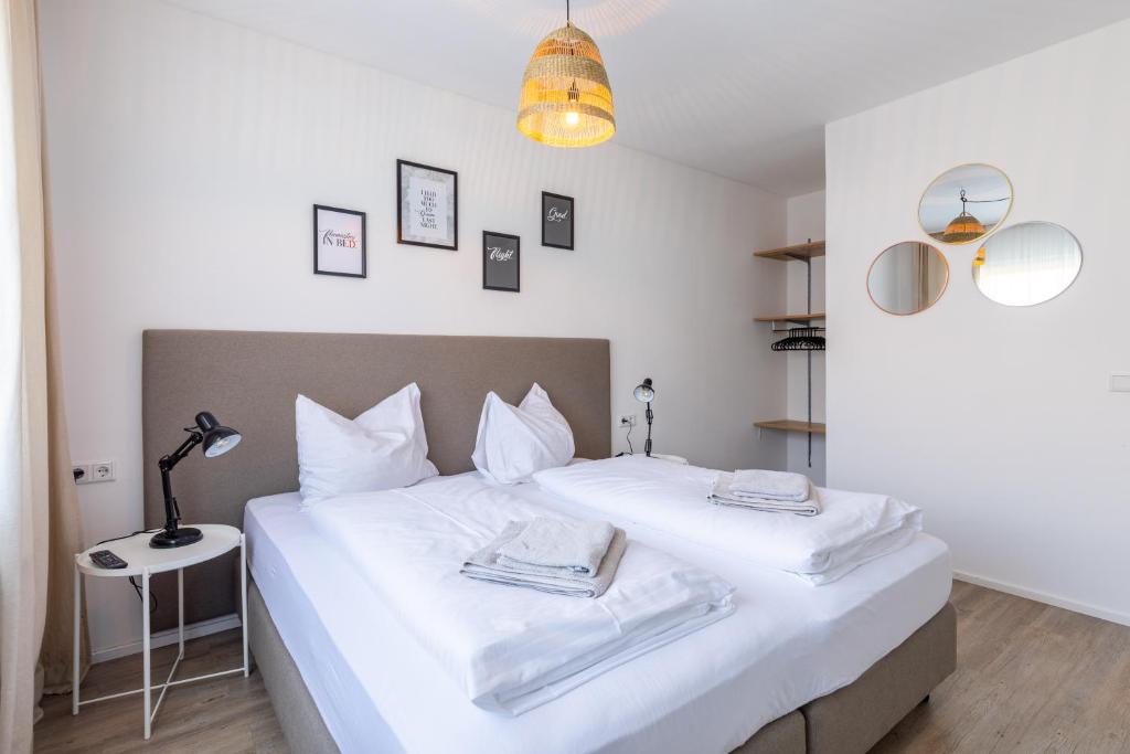 Postel nebo postele na pokoji v ubytování Appartements DAS RETTENBACHER