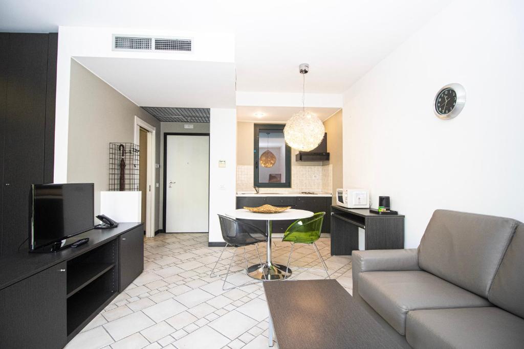 Posezení v ubytování CasAlbergo - Superior Lake Apartments by LVG Hotel Collection