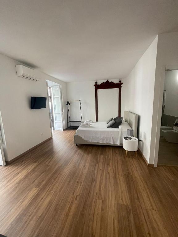 Łóżko lub łóżka w pokoju w obiekcie Quattrocantiapartments