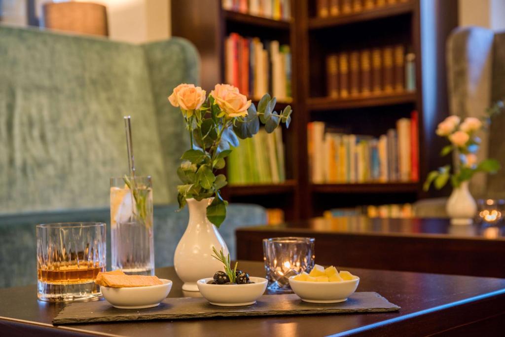 Nápoje v ubytování Logis Hotel QUARTIER 5, Sächsische Schweiz, mit Restaurant, Café & Bar