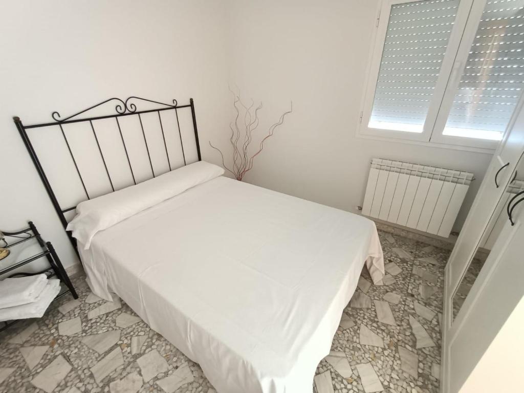 Postel nebo postele na pokoji v ubytování La Mejana