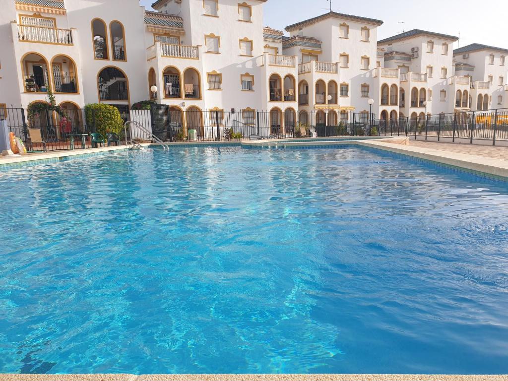 Bazén v ubytování Sunlight Apartment - Molino Blanco - La Zenia nebo v jeho okolí
