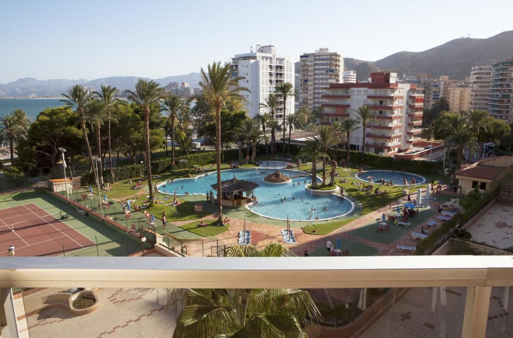 a view from the balcony of a resort with two pools at Apartamentos Florazar II Ajhory in Cullera